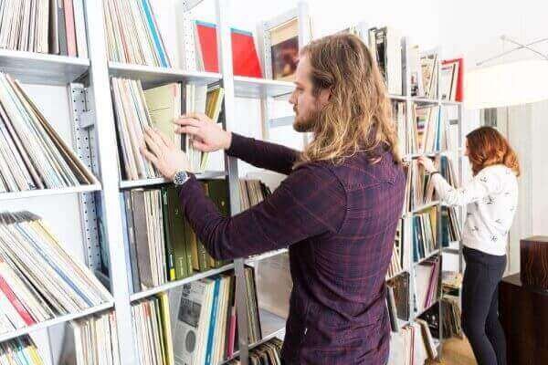 Couple searching for records to add to their collection