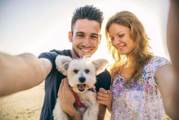 Couple with small Dog